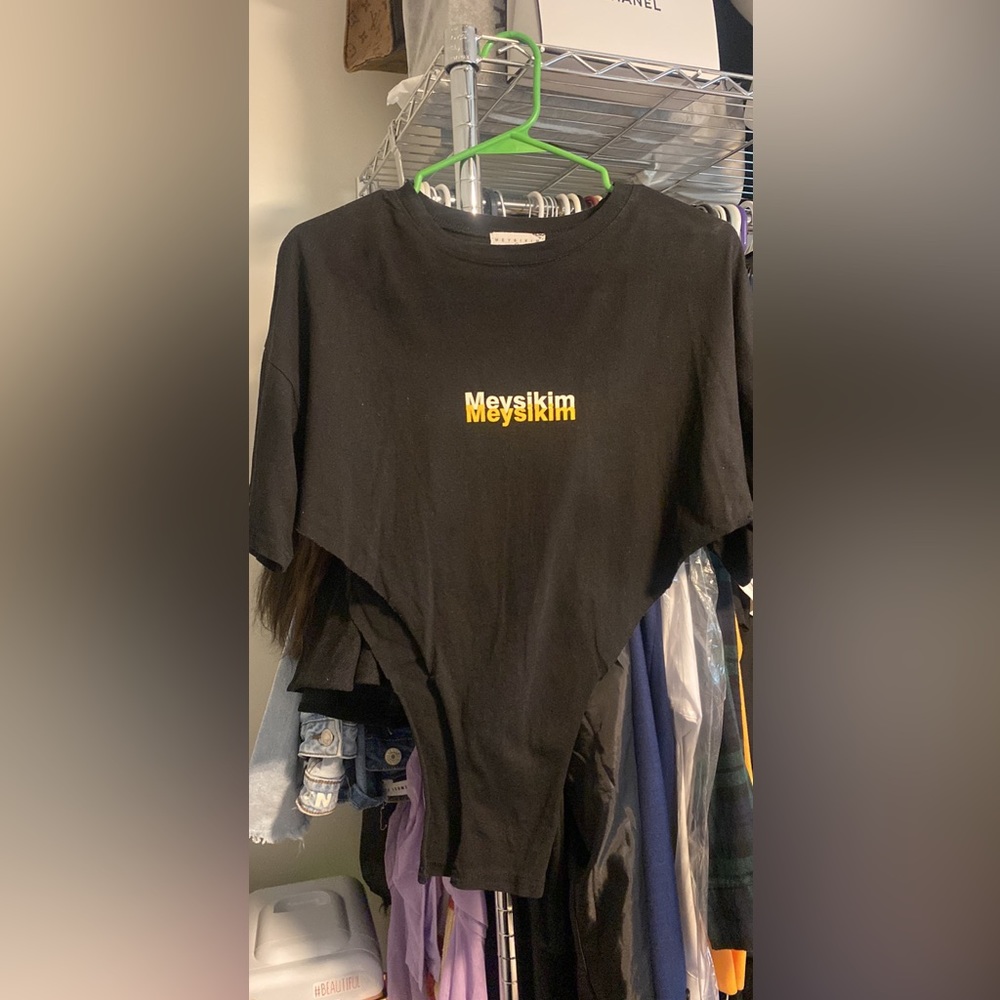 Asymmetrical women’s large graphic top